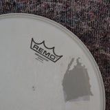 Used Remo Ambassador Coated 12" Drum Head with Tape Marks